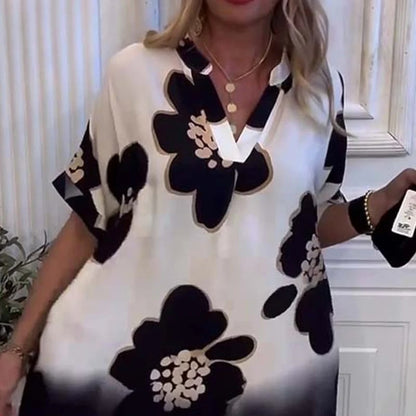 Stina™ | Stilvolles Kleid mit tiefem V-Ausschnitt und Print